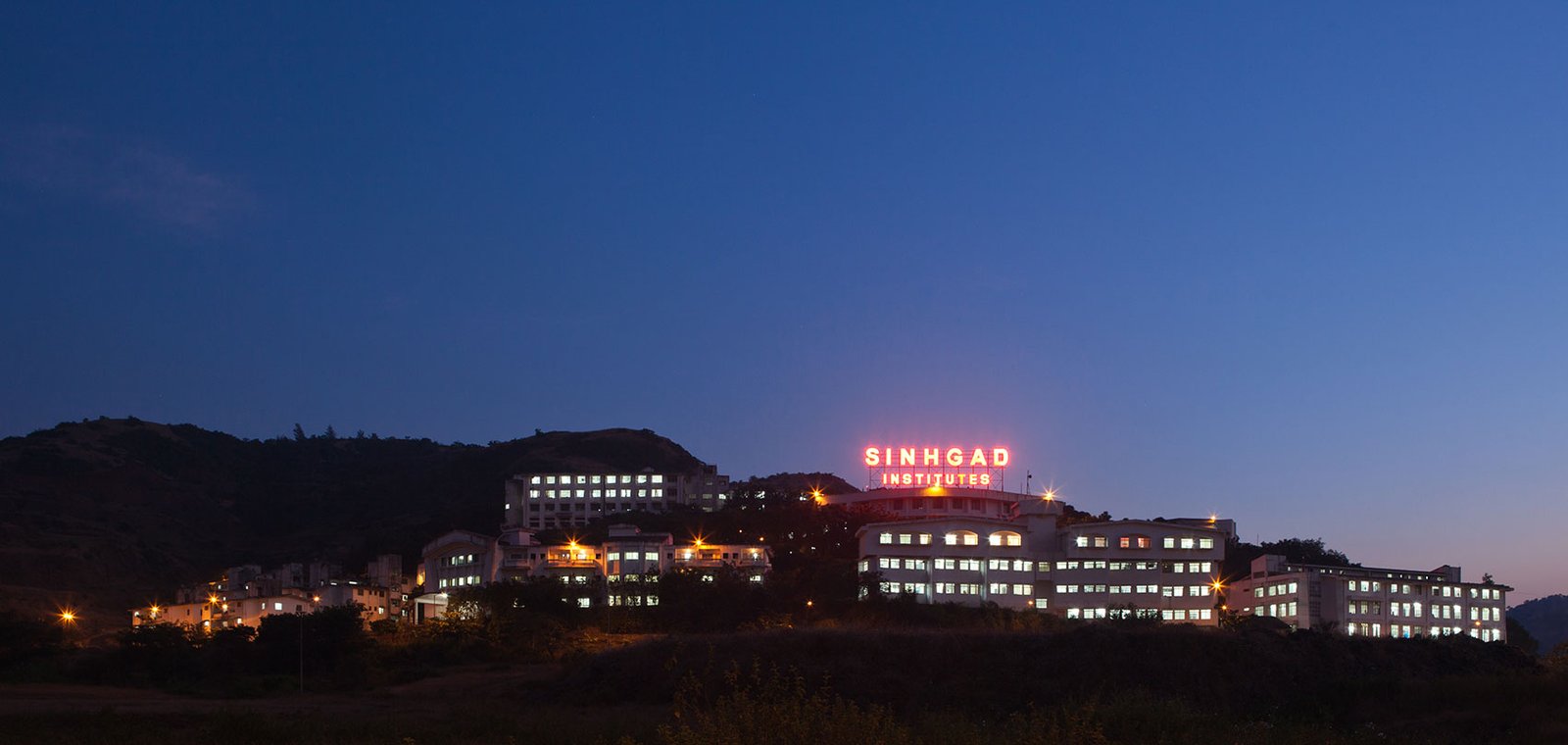 Sinhgad Technical Education Society Nivruti Babaji Navale College of Commerce and science logo